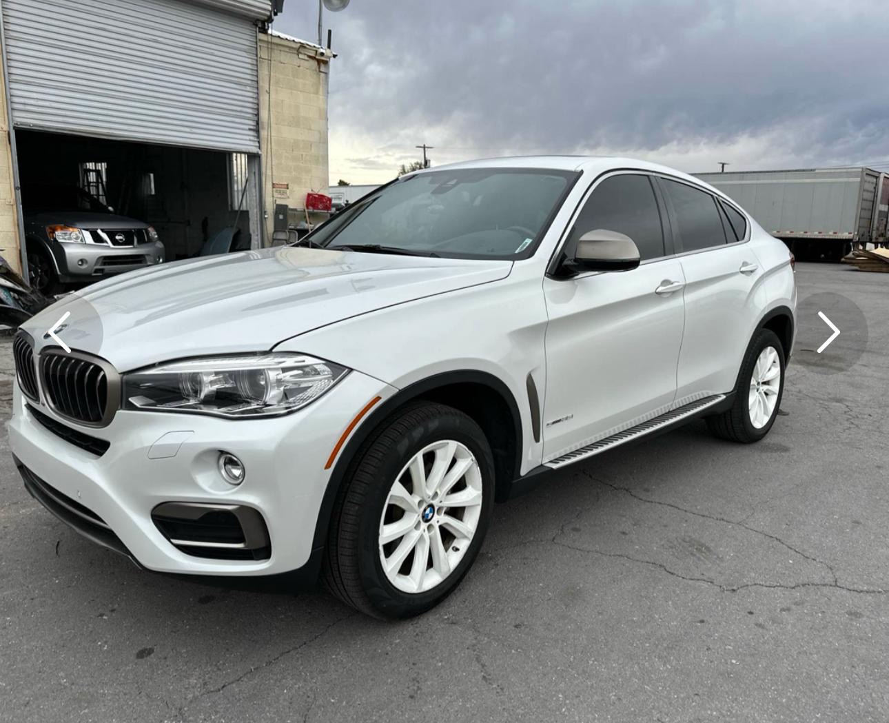 BMW X6 before custom paint - original white color